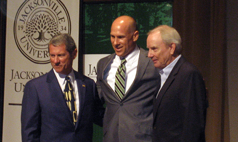 JU President Kerry Romesburg (left), DIrector of Athletics Brad Edwards and John Harrison, chairman of the Athletic Committee of the Board of Trustees, at Wednesday's press conference.